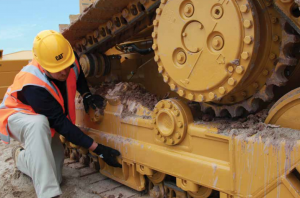 Cat dozers tracks getting checked